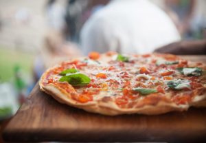 Pizza on tray, selective focus